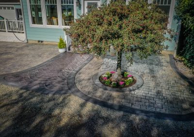 Cobblestone decorative concrete with European fan walkway