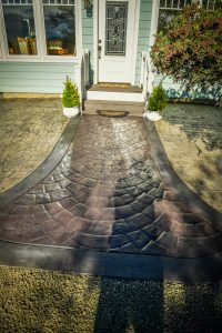 cobblestone decorative concrete with european fan walkway