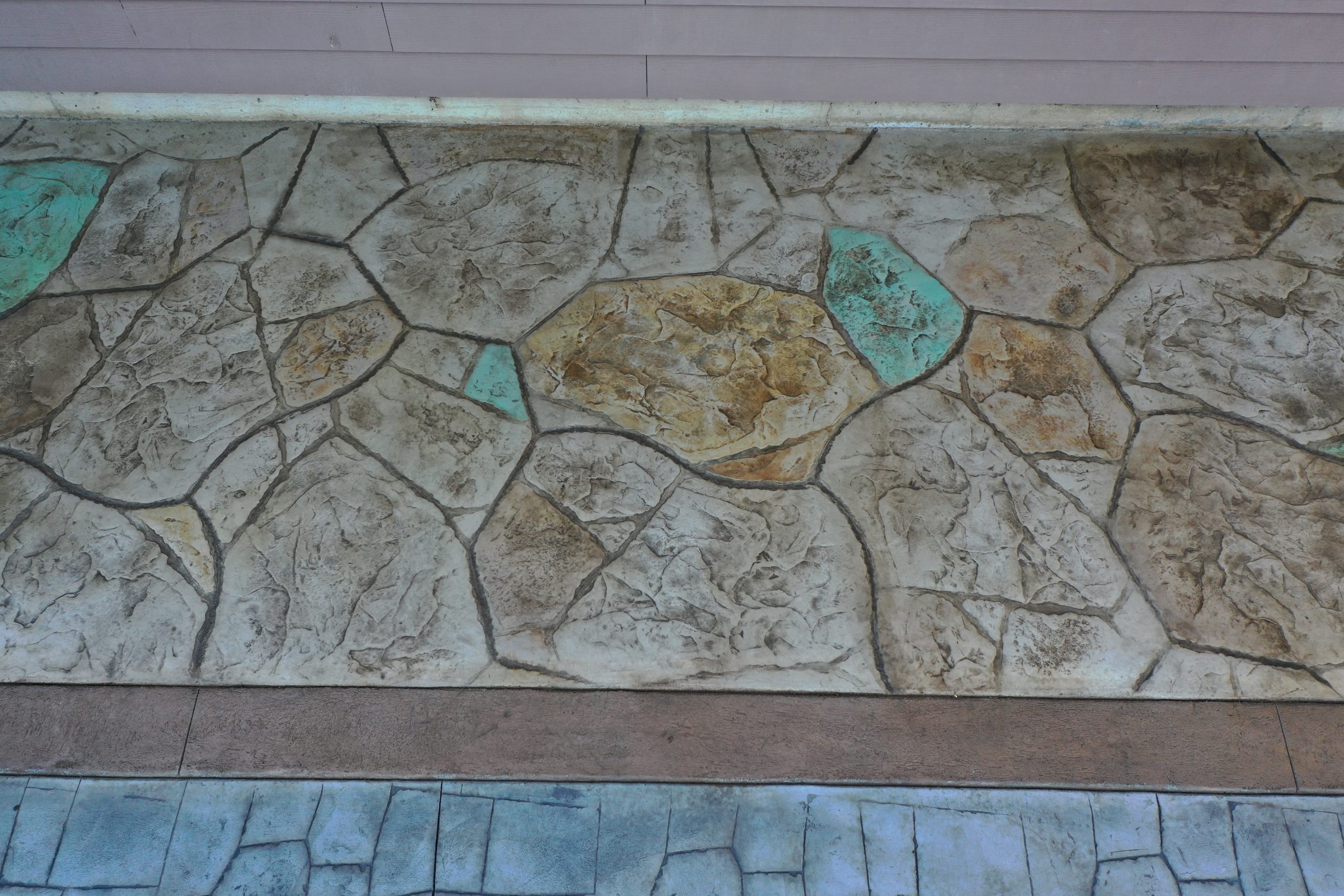 OCF decorative concrete | Decorative Concrete including stamped concrete, overlays, epoxy floors, and vertical rock. OCF decorative concrete
