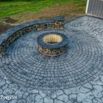 concrete patio and fireplace