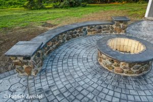 cobblestone patio with fireplace