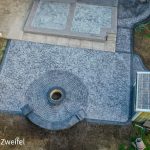 stamped concrete patio and fireplace