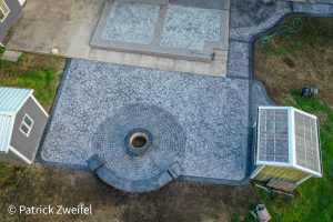 stamped concrete patio and fireplace