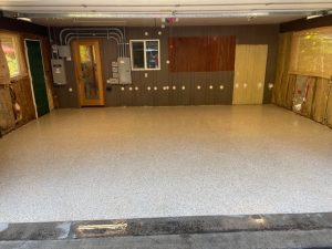 Epoxy Flake Floor and Acid Stain | Decorative Concrete including stamped concrete, overlays, epoxy floors, and vertical rock. Epoxy Flake Floor and Acid Stain
