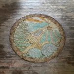 acid stained custom concrete medallion