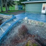 Custom Cut Ashlar Pattern & 13′ Medallion with Random Stone Concrete Retaining Wall