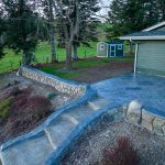 Custom Cut Ashlar Pattern & 13′ Medallion with Random Stone Concrete Retaining Wall