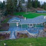 Custom Cut Ashlar Pattern & 13′ Medallion with Random Stone Concrete Retaining Wall