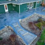 Custom Cut Ashlar Pattern & 13′ Medallion with Random Stone Concrete Retaining Wall