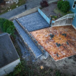 cobblestone conrete driveway, retaining wall, acid stain rockaway oregon