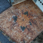 cobblestone conrete driveway, retaining wall, acid stain rockaway oregon
