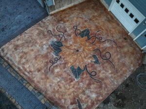 cobblestone conrete driveway, retaining wall, acid stain rockaway oregon