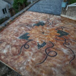 cobblestone conrete driveway, retaining wall, acid stain rockaway oregon