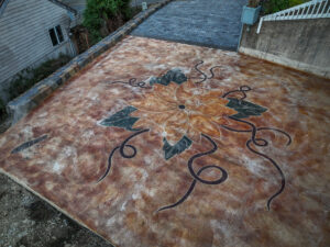 cobblestone conrete driveway, retaining wall, acid stain rockaway oregon