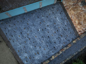 cobblestone conrete driveway, retaining wall, acid stain rockaway oregon