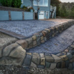 cobblestone conrete driveway, retaining wall, acid stain rockaway oregon