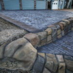 cobblestone conrete driveway, retaining wall, acid stain rockaway oregon