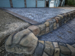 cobblestone conrete driveway, retaining wall, acid stain rockaway oregon