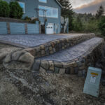 cobblestone conrete driveway, retaining wall, acid stain rockaway oregon