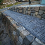 cobblestone conrete driveway, retaining wall, acid stain rockaway oregon