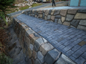 cobblestone conrete driveway, retaining wall, acid stain rockaway oregon