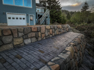 cobblestone conrete driveway, retaining wall, acid stain rockaway oregon