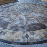 concrete medallion and flagstone patio