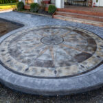 concrete medallion and flagstone patio