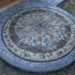 concrete medallion and flagstone patio