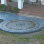 concrete medallion and flagstone patio