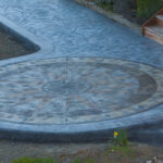 concrete medallion and flagstone patio