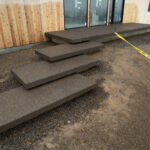 concrete medallion and flagstone patio