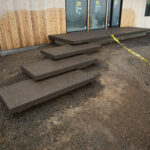concrete medallion and flagstone patio