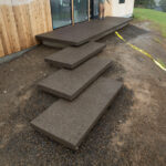 concrete medallion and flagstone patio