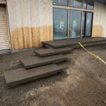 concrete medallion and flagstone patio