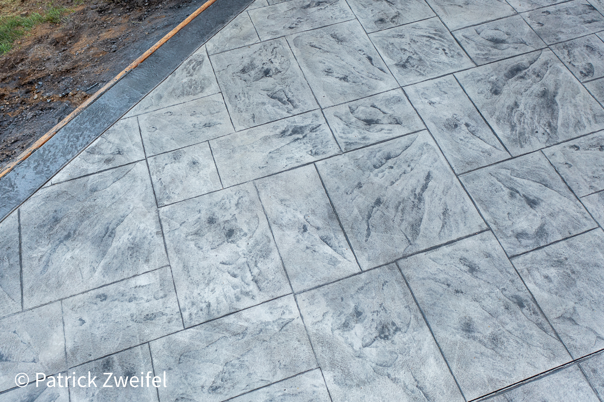 Untitled-20 | Decorative Concrete including stamped concrete, overlays, epoxy floors, and vertical rock.